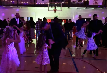 Fathers and daughters dancing